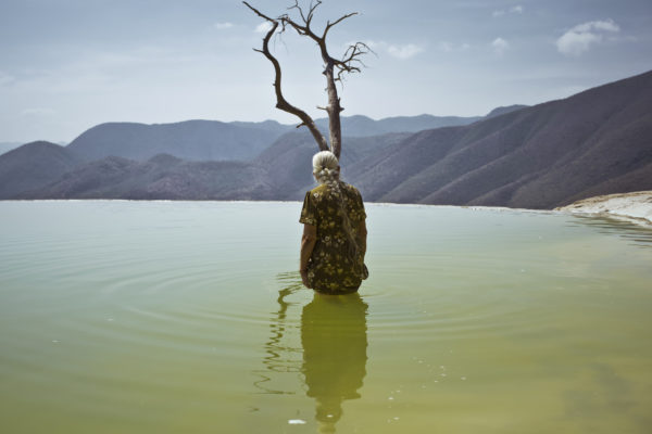 Hierve el Agua are petrified waterfalls and sulfuric spring source located in the state of Oaxaca. despite the growng affluence of tourists it remains a sacred place for natives.